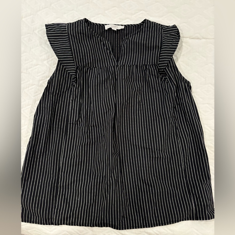 Black blouse with white strips. Great for work.